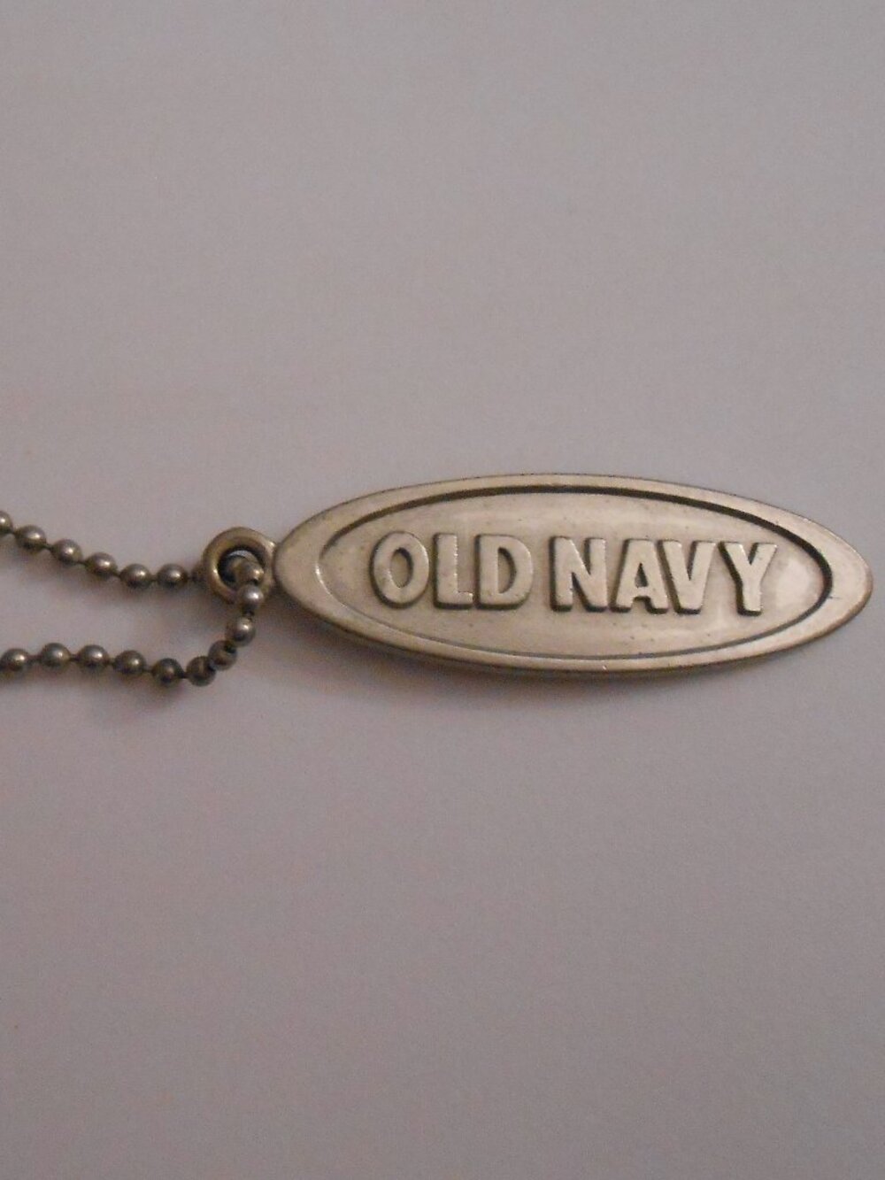 Old Navy Silver Oval Shaped Keychain, Circa 2000's, Clothing/Shoes/Accessories